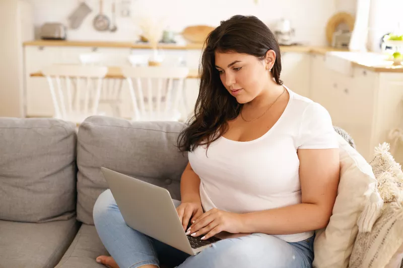 Woman on laptop.