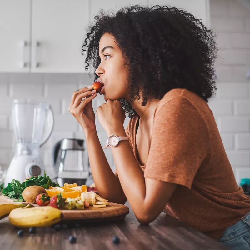 A woman eating healthy. 