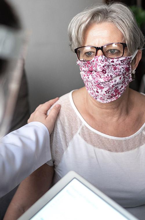 A woman visiting her doctor.