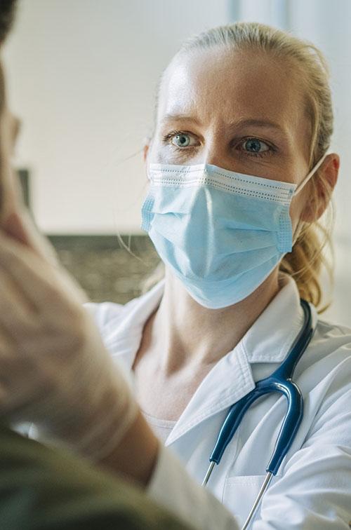 Female physician with patient